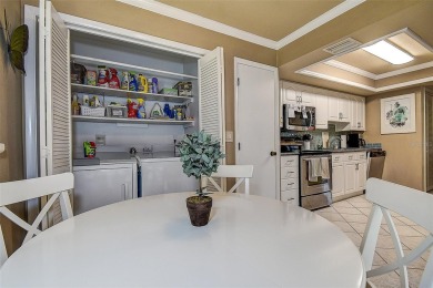 A true gem nestled in the GATED COMMUNITY of East Lake Woodlands on Emerald Greens Golf Resort and Country Club in Florida - for sale on GolfHomes.com, golf home, golf lot