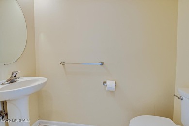 This warm and inviting 3-bedroom, 2.5-bath home sits in a on Forsgate Country Club in New Jersey - for sale on GolfHomes.com, golf home, golf lot
