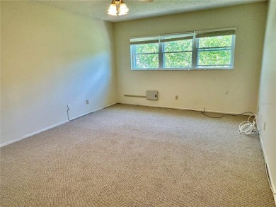 Welcome home to this move in ready, freshly painted 2 bed, 2 on On Top Of The World Golf Course in Florida - for sale on GolfHomes.com, golf home, golf lot