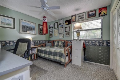 A true gem nestled in the GATED COMMUNITY of East Lake Woodlands on Emerald Greens Golf Resort and Country Club in Florida - for sale on GolfHomes.com, golf home, golf lot