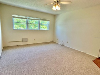 Welcome home to this move in ready, freshly painted 2 bed, 2 on On Top Of The World Golf Course in Florida - for sale on GolfHomes.com, golf home, golf lot