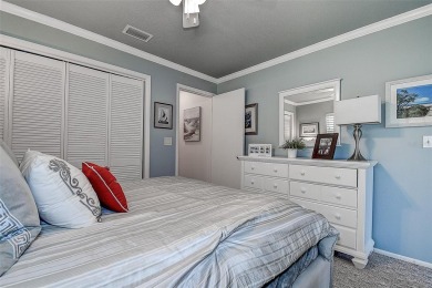 A true gem nestled in the GATED COMMUNITY of East Lake Woodlands on Emerald Greens Golf Resort and Country Club in Florida - for sale on GolfHomes.com, golf home, golf lot