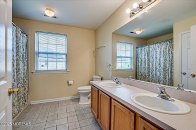 This warm and inviting 3-bedroom, 2.5-bath home sits in a on Forsgate Country Club in New Jersey - for sale on GolfHomes.com, golf home, golf lot