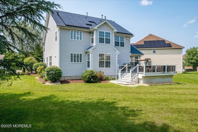 This warm and inviting 3-bedroom, 2.5-bath home sits in a on Forsgate Country Club in New Jersey - for sale on GolfHomes.com, golf home, golf lot