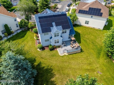 This warm and inviting 3-bedroom, 2.5-bath home sits in a on Forsgate Country Club in New Jersey - for sale on GolfHomes.com, golf home, golf lot
