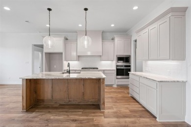 Welcome to this stunning Modified St. Lucie Classic Series home on Nutcracker Golf Club in Texas - for sale on GolfHomes.com, golf home, golf lot