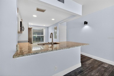 Enjoy resort-style living in the Isla Del Sol Golf Course on Isla Del Sol Yacht and Country Club in Florida - for sale on GolfHomes.com, golf home, golf lot