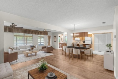 One or more photo(s) has been virtually staged. Nestled in on Highland Lakes Executive Golf Course in Florida - for sale on GolfHomes.com, golf home, golf lot