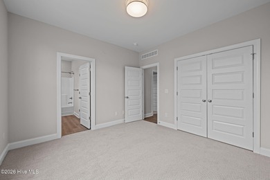 The Coventry welcomes you home. This newly-constructed 3-bedroom on Carolina Colours Golf Club in North Carolina - for sale on GolfHomes.com, golf home, golf lot