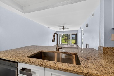 Enjoy resort-style living in the Isla Del Sol Golf Course on Isla Del Sol Yacht and Country Club in Florida - for sale on GolfHomes.com, golf home, golf lot