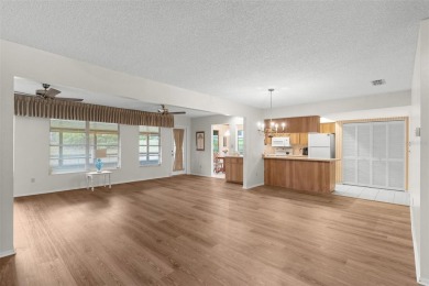 One or more photo(s) has been virtually staged. Nestled in on Highland Lakes Executive Golf Course in Florida - for sale on GolfHomes.com, golf home, golf lot
