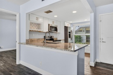 Enjoy resort-style living in the Isla Del Sol Golf Course on Isla Del Sol Yacht and Country Club in Florida - for sale on GolfHomes.com, golf home, golf lot