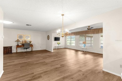One or more photo(s) has been virtually staged. Nestled in on Highland Lakes Executive Golf Course in Florida - for sale on GolfHomes.com, golf home, golf lot