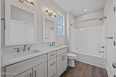 The Coventry welcomes you home. This newly-constructed 3-bedroom on Carolina Colours Golf Club in North Carolina - for sale on GolfHomes.com, golf home, golf lot