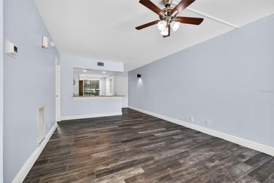 Enjoy resort-style living in the Isla Del Sol Golf Course on Isla Del Sol Yacht and Country Club in Florida - for sale on GolfHomes.com, golf home, golf lot