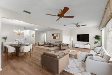 One or more photo(s) has been virtually staged. Nestled in on Highland Lakes Executive Golf Course in Florida - for sale on GolfHomes.com, golf home, golf lot