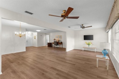 One or more photo(s) has been virtually staged. Nestled in on Highland Lakes Executive Golf Course in Florida - for sale on GolfHomes.com, golf home, golf lot