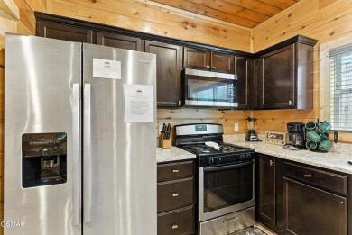 Location, charm, and rental potential all wrapped into one! on Gatlinburg Golf Course in Tennessee - for sale on GolfHomes.com, golf home, golf lot