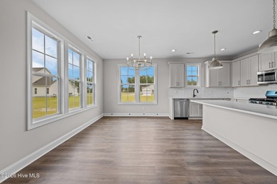 The Coventry welcomes you home. This newly-constructed 3-bedroom on Carolina Colours Golf Club in North Carolina - for sale on GolfHomes.com, golf home, golf lot