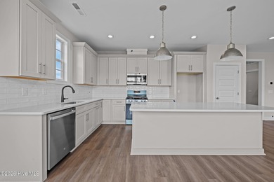 The Coventry welcomes you home. This newly-constructed 3-bedroom on Carolina Colours Golf Club in North Carolina - for sale on GolfHomes.com, golf home, golf lot