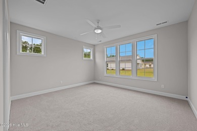 The Coventry welcomes you home. This newly-constructed 3-bedroom on Carolina Colours Golf Club in North Carolina - for sale on GolfHomes.com, golf home, golf lot