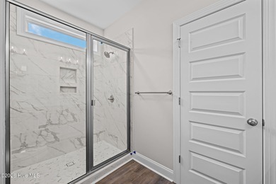 The Coventry welcomes you home. This newly-constructed 3-bedroom on Carolina Colours Golf Club in North Carolina - for sale on GolfHomes.com, golf home, golf lot