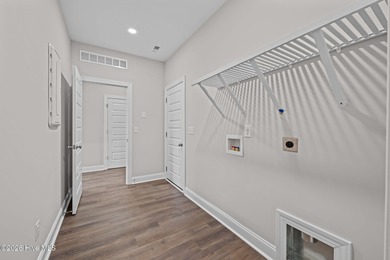 The Coventry welcomes you home. This newly-constructed 3-bedroom on Carolina Colours Golf Club in North Carolina - for sale on GolfHomes.com, golf home, golf lot