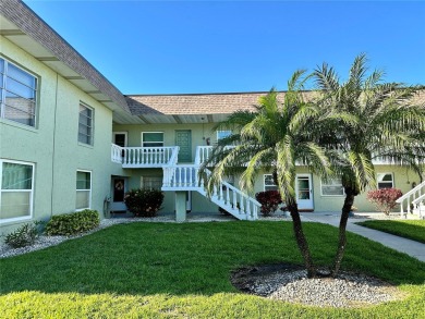 Amazing location in a 55+ community with a Sparkling Heated pool on Tarpon Springs Golf Course in Florida - for sale on GolfHomes.com, golf home, golf lot