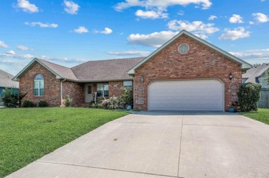 Welcome to this 3-bedroom, 2.5-bathroom home nestled within a on Marshfield Country Club in Missouri - for sale on GolfHomes.com, golf home, golf lot