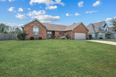 Welcome to this 3-bedroom, 2.5-bathroom home nestled within a on Marshfield Country Club in Missouri - for sale on GolfHomes.com, golf home, golf lot