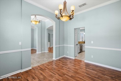 Situated in the highly sought-after Fleming Island Plantation on Golf Club At Fleming Island in Florida - for sale on GolfHomes.com, golf home, golf lot