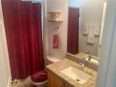 This 1,489 square foot is awaiting your updates. Enter through on Tampa Bay Golf and Country Club in Florida - for sale on GolfHomes.com, golf home, golf lot