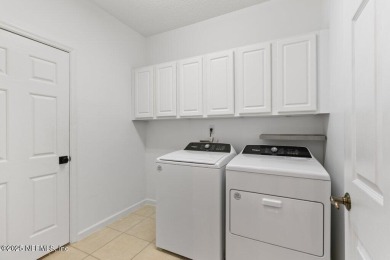Discover the charm of carefree living in the highly sought-after on Slammer and Squire Golf Course in Florida - for sale on GolfHomes.com, golf home, golf lot