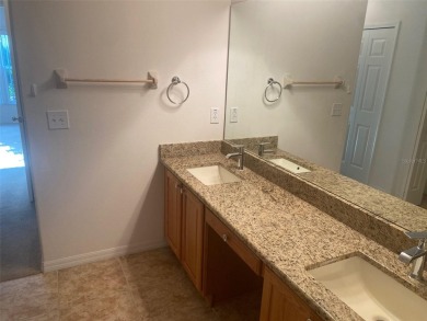 This 1,489 square foot is awaiting your updates. Enter through on Tampa Bay Golf and Country Club in Florida - for sale on GolfHomes.com, golf home, golf lot