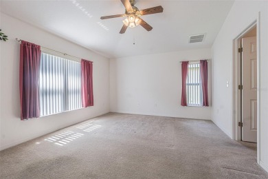 This 1,489 square foot is awaiting your updates. Enter through on Tampa Bay Golf and Country Club in Florida - for sale on GolfHomes.com, golf home, golf lot