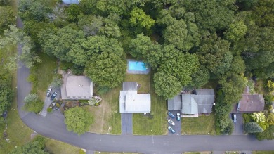 Set on a quiet, tree-lined street in the heart of Stony Point on Patriot Hills Golf Club in New York - for sale on GolfHomes.com, golf home, golf lot