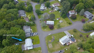 Set on a quiet, tree-lined street in the heart of Stony Point on Patriot Hills Golf Club in New York - for sale on GolfHomes.com, golf home, golf lot