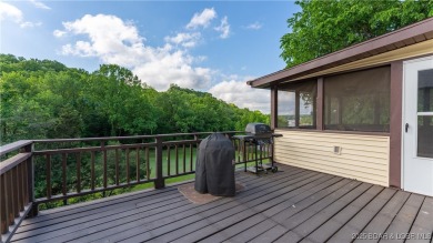 SPACIOUS, GREAT LOCATION, VIEW OF GOLF COURSE AND LAKE - This on The Oaks Golf Course in Missouri - for sale on GolfHomes.com, golf home, golf lot