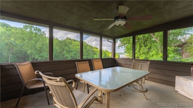 SPACIOUS, GREAT LOCATION, VIEW OF GOLF COURSE AND LAKE - This on The Oaks Golf Course in Missouri - for sale on GolfHomes.com, golf home, golf lot
