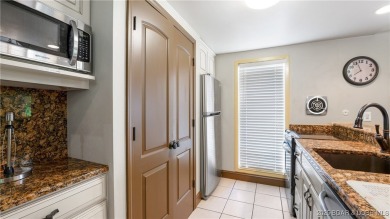 SPACIOUS, GREAT LOCATION, VIEW OF GOLF COURSE AND LAKE - This on The Oaks Golf Course in Missouri - for sale on GolfHomes.com, golf home, golf lot