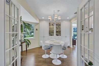 Welcome to this stunning two bedroom, two bath villa nestled in on Highland Lakes Executive Golf Course in Florida - for sale on GolfHomes.com, golf home, golf lot