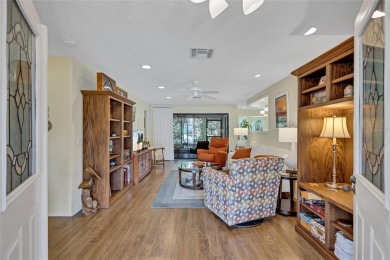 Welcome to this stunning two bedroom, two bath villa nestled in on Highland Lakes Executive Golf Course in Florida - for sale on GolfHomes.com, golf home, golf lot