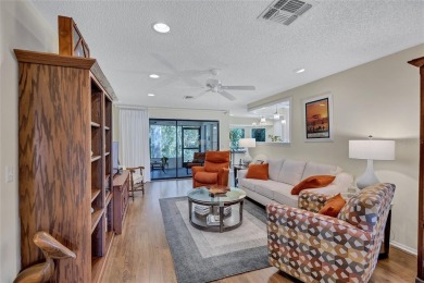 Welcome to this stunning two bedroom, two bath villa nestled in on Highland Lakes Executive Golf Course in Florida - for sale on GolfHomes.com, golf home, golf lot