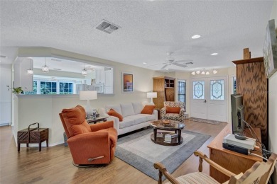 Welcome to this stunning two bedroom, two bath villa nestled in on Highland Lakes Executive Golf Course in Florida - for sale on GolfHomes.com, golf home, golf lot