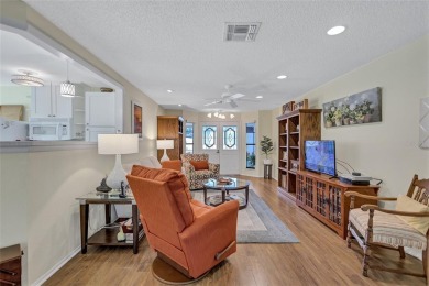 Welcome to this stunning two bedroom, two bath villa nestled in on Highland Lakes Executive Golf Course in Florida - for sale on GolfHomes.com, golf home, golf lot