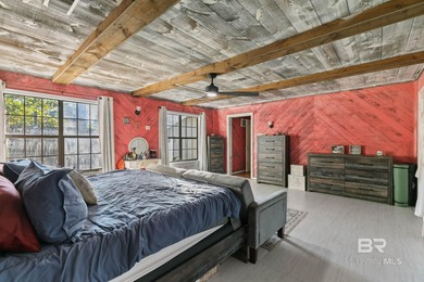 Step inside this spacious 4-bedroom, 2-bath ranch-style home on on Lake Forest Yacht and Country Club in Alabama - for sale on GolfHomes.com, golf home, golf lot