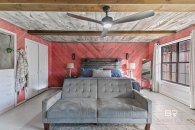 Step inside this spacious 4-bedroom, 2-bath ranch-style home on on Lake Forest Yacht and Country Club in Alabama - for sale on GolfHomes.com, golf home, golf lot