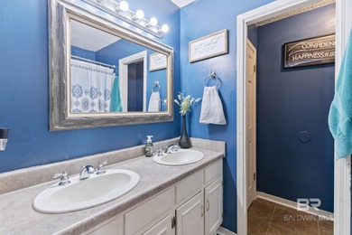 Step inside this spacious 4-bedroom, 2-bath ranch-style home on on Lake Forest Yacht and Country Club in Alabama - for sale on GolfHomes.com, golf home, golf lot