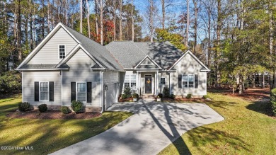 Welcome to this stunning 3-bedroom, 2.5-bathroom home located in on Cypress Landing Golf Club in North Carolina - for sale on GolfHomes.com, golf home, golf lot