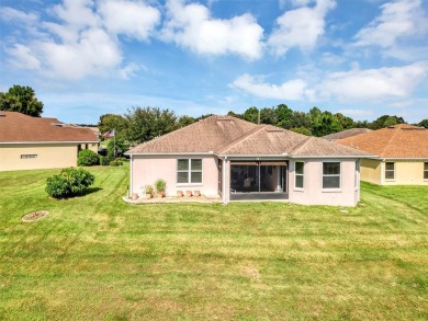 Affordable Low-Maintenance Stucco Home in Guard Gated, Active on Arlington Ridge Golf Club in Florida - for sale on GolfHomes.com, golf home, golf lot